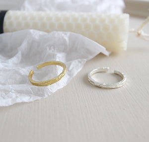 Irregular embossed fine ring