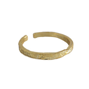 Irregular embossed fine ring